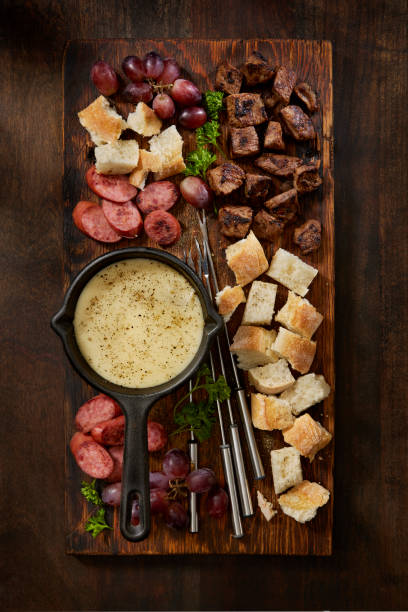 istock Cheese Fondue Platter with Grilled Steak Bites 1364027010