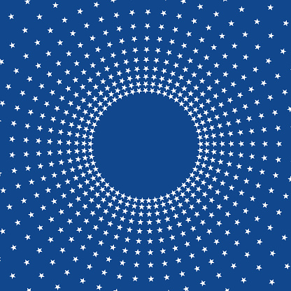 Copy space and full frame white stars in spoke pattern, on blue background