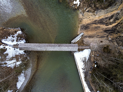 Bridge over a river at winter