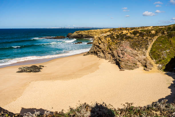 istock Cliffs and sand on Cerca Nova Beach, Alentejo, Portugal 1364043620