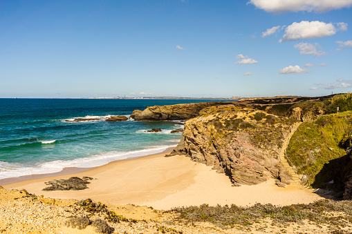 Acantilados y arena en la playa de Cerca Nova, Alentejo, Portugal photo