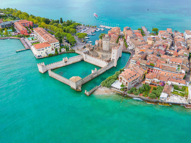 Scaliger Castle in Sirmione, Italy - 02.08.2021. Rocca Scaligera Castle in Sirmione Lake Garda Italy. Aerial view. stock photo
