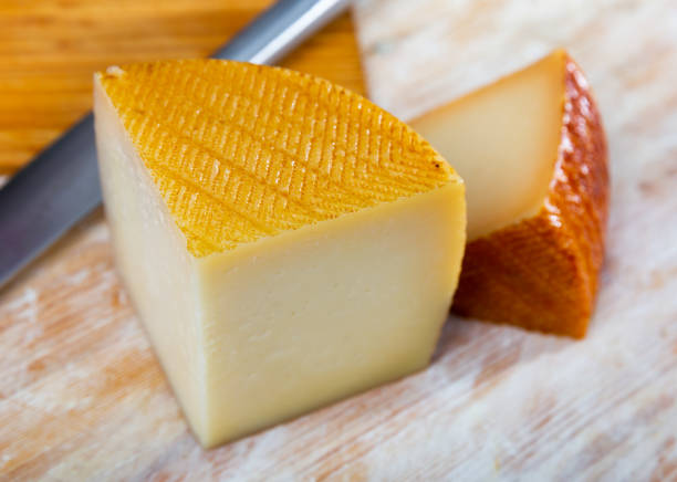 istock Sliced spanish semi hard cheese from cow milk 1364049220