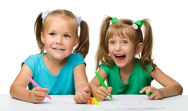 istock Two little girls draw with markers 136404948