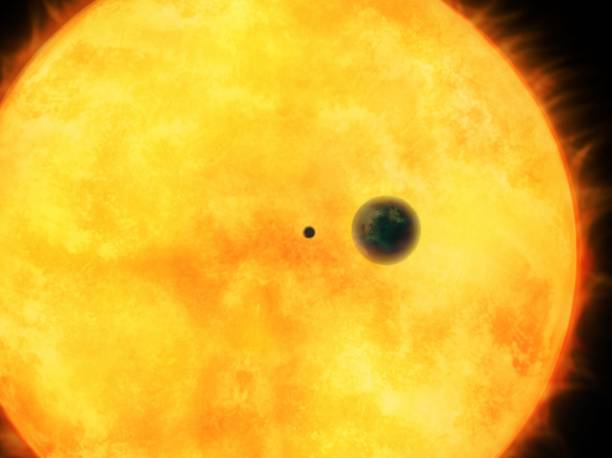 Size of the rocky and gas planets against the background of a star stock photo