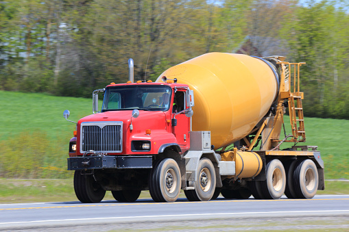 Cement mixer delivering its load of cement.