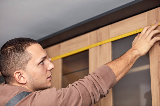 istock Handyman making kitchen wall cabinets in the apartment. 1364054648