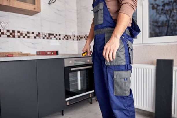 istock Handyman making kitchen wall cabinets in the apartment. 1364054673