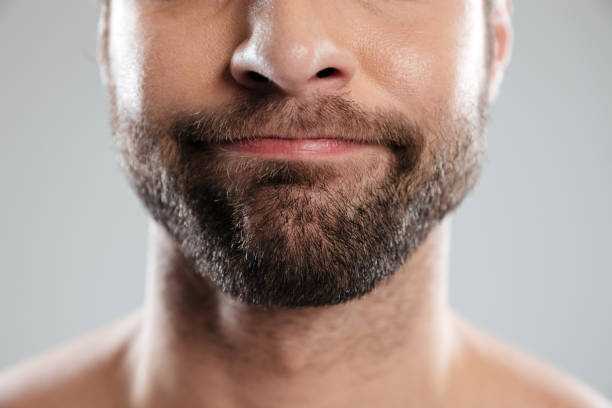 istock Cropped image of a doubtful bearded mans face 1364054706