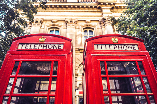 London telephone booth row. London landmarks - red phone booths.