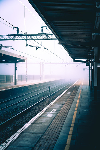 Railway station on a misty morning