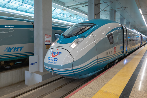 Ankara, Turkey - September 2021: YHT fast train, high speed train at platform in Anakra station. YHT is the only high-speed rail service in Turkey