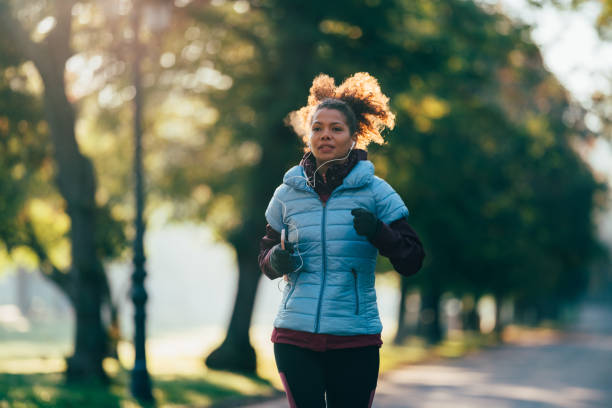 istock Jogging in autumn park 1364064388