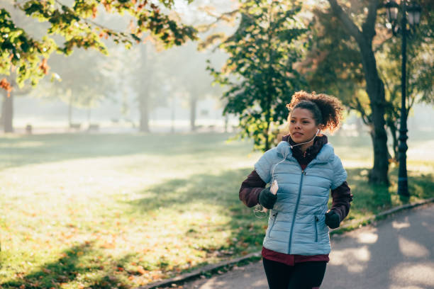 istock Jogging in autumn park 1364064467