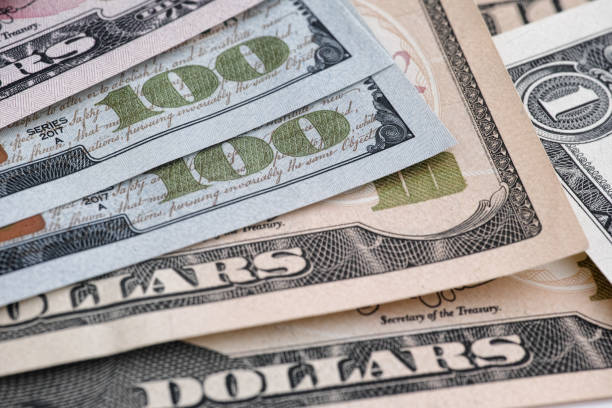 istock American dollar bills in a pile 1364066798