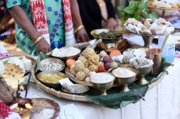 Bhogali Bihu Preparation Assamese traditional food items displayed for sell in a stall ahead of Bhogali Bihu Festiva. assam india stock pictures, royalty-free photos & images