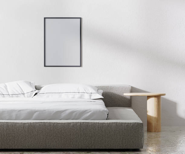 istock frame mockup in bedroom interior, minimalist style, white wall, 3d render 1364067172