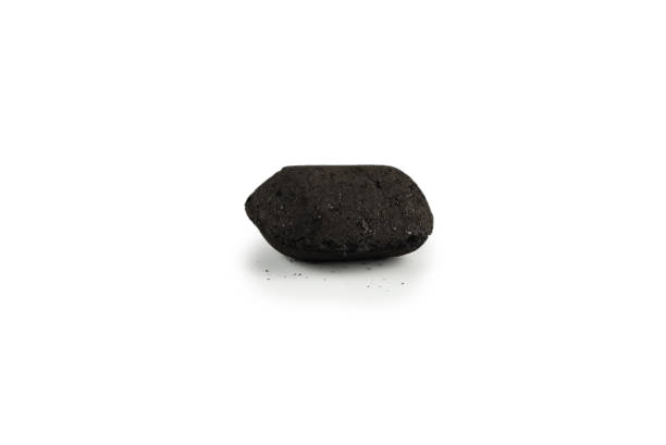 istock Black oak coal isolated on white background. 1364068530