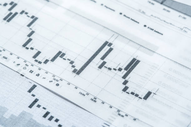 istock Trading charts reports printed on paper 1364070911