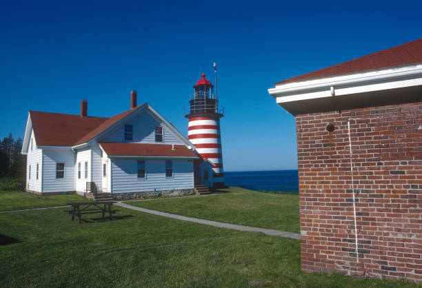 Quoddy Head Lighthouse Horizontal - 1994 Quoddy Head Lighthouse Horizontal - 1994. Scanned from Kodachrome 25 slide. quoddy head state park stock pictures, royalty-free photos & images