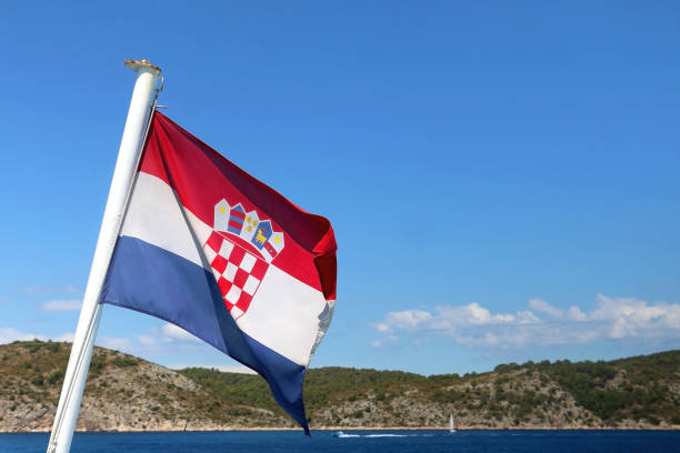 istock Croatian Flag and Adriatic Sea 1364081601