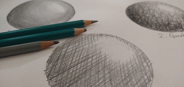 Strokes with pencil on white sheet of paper