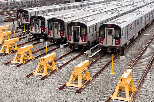 Freight trains. The concept of cargo transportation by rail. Cars for loading. Railway station