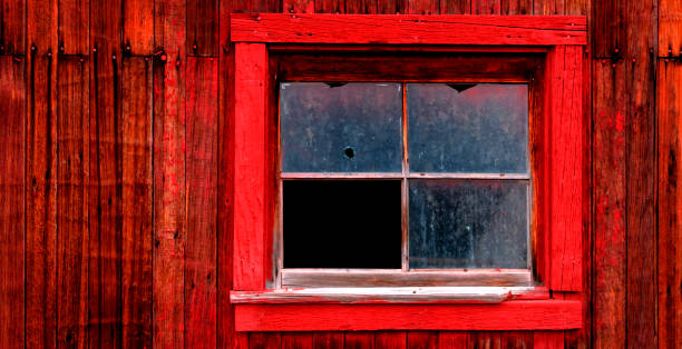 istock Old Red Barn Wooden Wall Window Frame and Glass Background Texture with Nails 1364086857