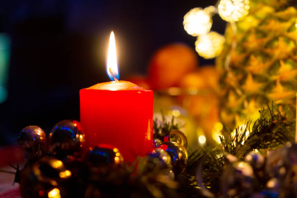 christmas candle burns in the dark