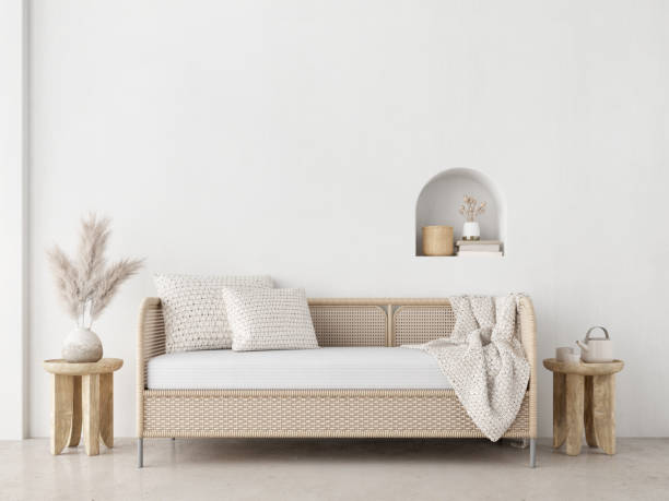 istock Boho style living room with wicker sofa and pampas in the pot on white wall background.3d rendering 1364090728