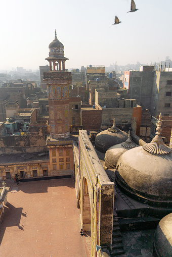 A glimpse at the top portion of the magnificent Taj Mahal, situated in the city of Agra, on a sunny Spring day.