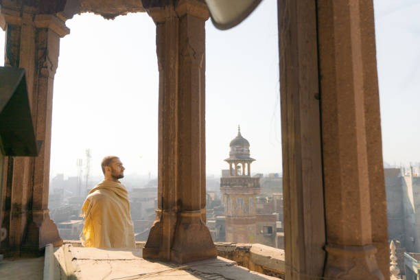 istock Man walking in the mosque in Lahore 1364091257