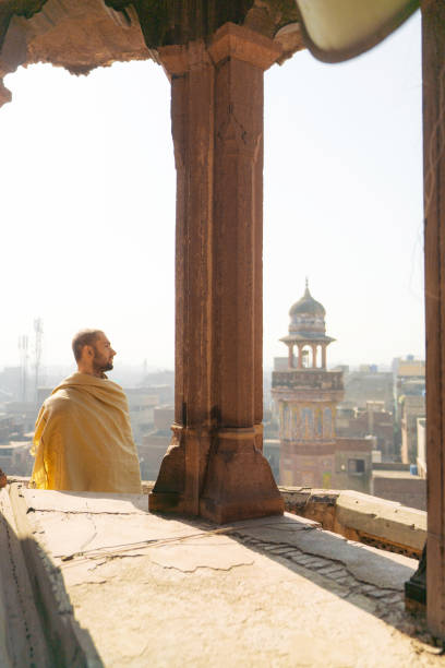 istock Man walking in the mosque in Lahore 1364091261