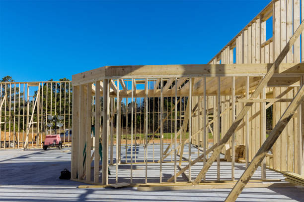 istock Framed new construction of residential construction house framing 1364092134