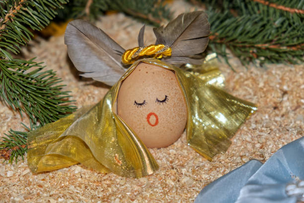 funny anthropized egg with angel face and virgin veil