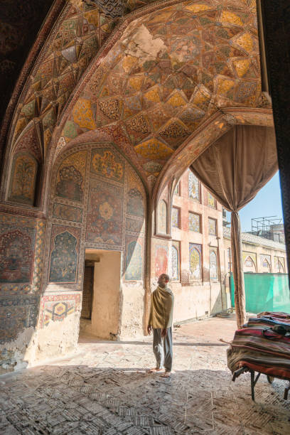 istock Man walking in the mosque in Lahore 1364094385