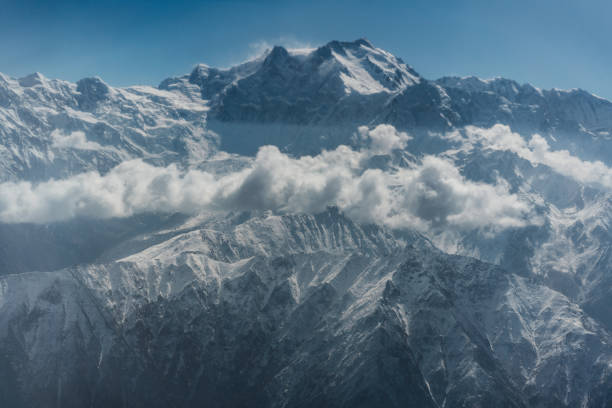 Scenic view of snowcapped Himalayas and Karakoram range from airplane Scenic view of snowcapped Himalayas and Karakoram range from airplane. Highest mountains on Earth k2 mountain panorama stock pictures, royalty-free photos & images