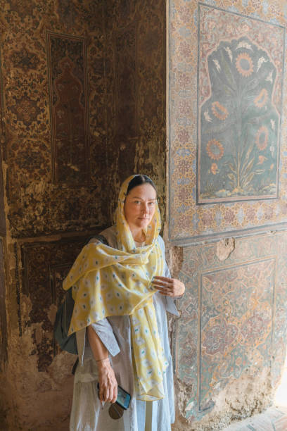 istock Woman in hijab  walking in mosque 1364095545