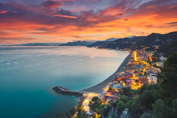 Aerial view of the beach of Varigotti during blue hour. Liguria, Italy Aerial view of the beach of Varigotti during blue hour. Liguria, Italy. finale ligure stock pictures, royalty-free photos & images