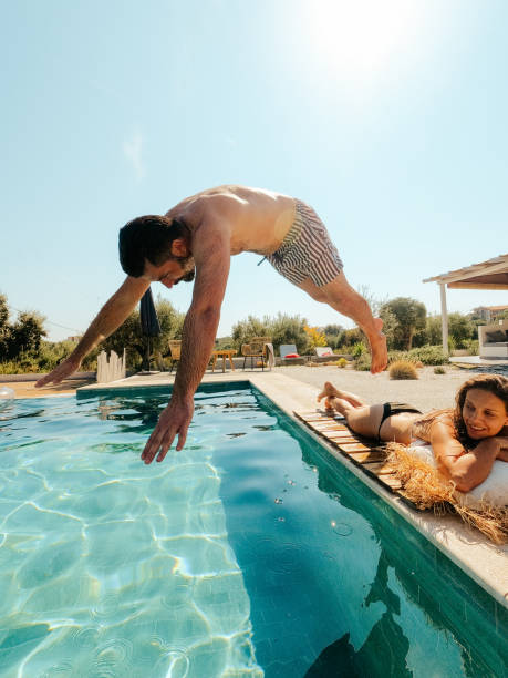 pooltage - vacations infinity pool relaxation women stock-fotos und bilder