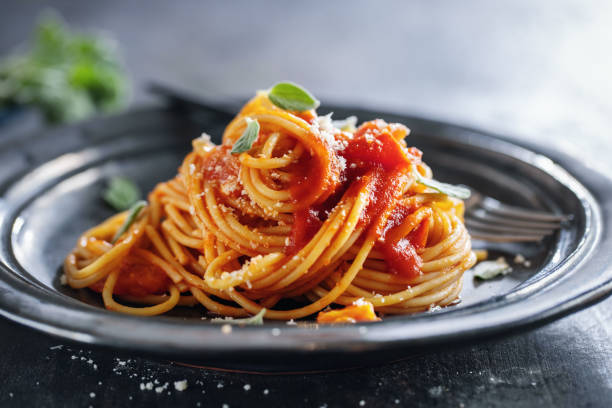istock Pasta with spaghetti sauce and cheese 1364096420