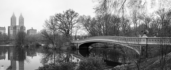 Bow bridge, Central Park, New York City on a rainy morning in black and white