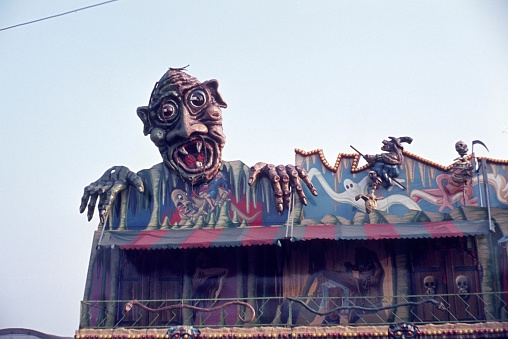 Berlin (West), Germany, 1975. Ghost train decoration on a fairground.