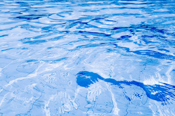 istock Blue water background. Abstract summer sea pattern. Pool water surface or wave texture. 1364098674