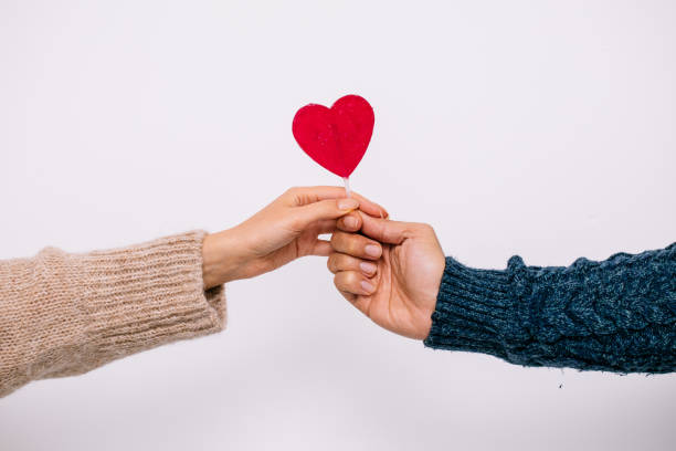 istock Man Giving Love to Woman 1364100953