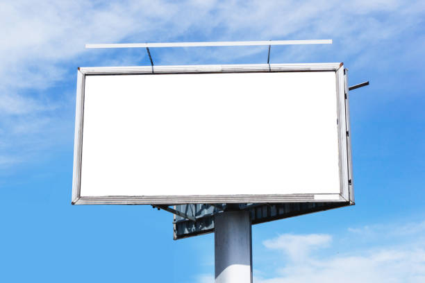 istock Blank billboard background. Cloudy blue sky advertisment texture. 1364106099
