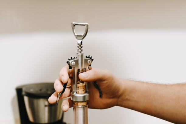istock Hands opening the glass of wine 1364107470