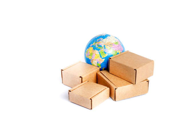 istock Earth globe is surrounded by boxes isolated on white background. Global business and international transportation of goods products. Shipping freight, world trade and economics. Distribution, import export. Commodity turnover 1364112505
