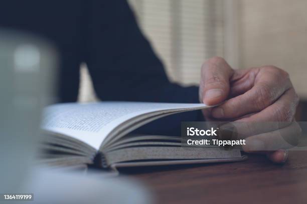 Man Reading Book Stock Photo - Download Image Now - Book, One Person, Opening