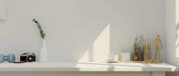 istock Close-up Minimal white workspace with copy space and accessories. 1364125211